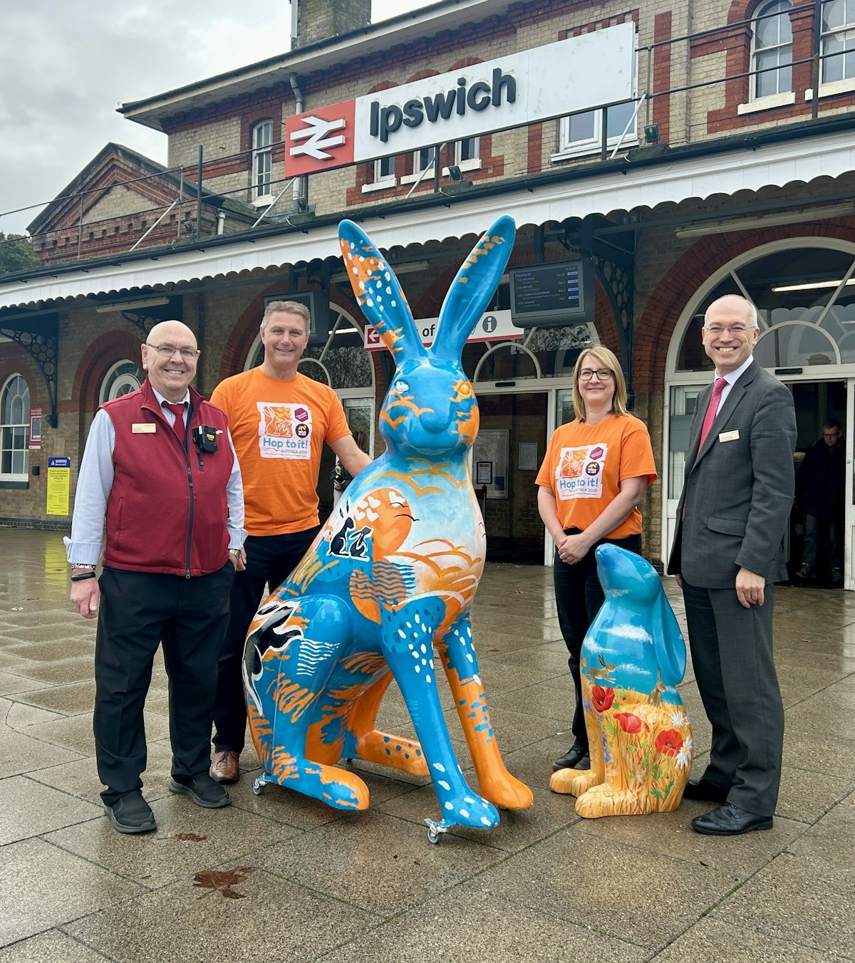 Hop to it team with Jonathan Denby outside train station